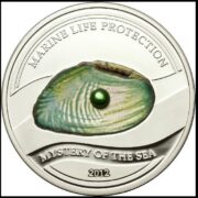 Жемчужина Загадки моря - 2012 - Палау - серебряная монета с  жемчужиной