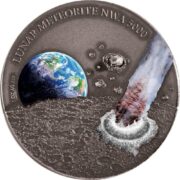Лунный метеорит NWA 5000 - Ниуэ - 2015 - серебряная монета с кусочком метеорита